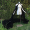 Manteau de mariée en mousseline de soie noire - Page 1