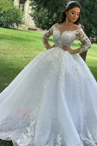 Robe de mariée Tulle Appliques Pomme Manche Aérienne Longue Eglise - Page 1